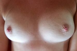 Wife's lovely tits. Fancy a suck? Comments please