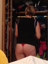 wife's big ass in tiny red thong ! :-)