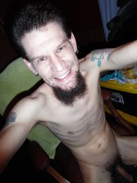 Fully nude body and cock shot with a smile