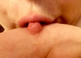 my lip just barely touching my pink nipple sooo erotic