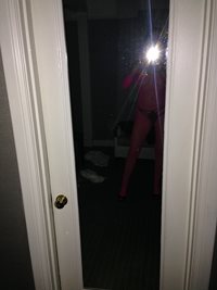 My selfie in the mirror wearing my naughty pink mesh suit and black thong i...