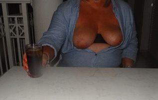 flashing my big tits while having a cooling drink on holiday