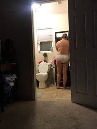 Washing my dildo after masturbating.