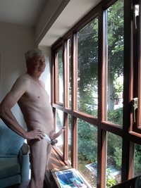 Showing my hard cock, panties and tied balls to the neighbours