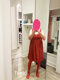 Trying on dresses at the store. Love the mirrors and the looks.