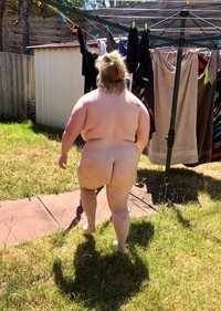 Enjoying being naked outside at home and happy to be seen by my neighbours