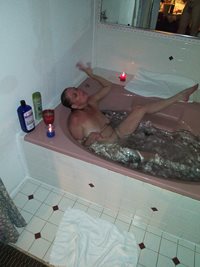 Wife enjoying a nice playful bath