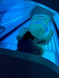 Tanning beds; nipples are warm and puffy