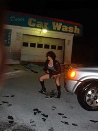 Peeing in front off the car wash as everyone driving by watches