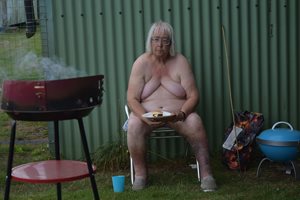 Maggie just loves a nude BBQ.