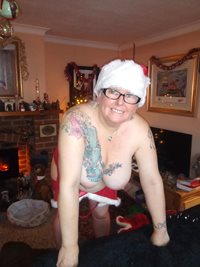 Another Christmas photo taken in the lounge leaning over the sofa with a ch...