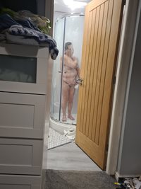 Shower time . Will someone pass her the soap?