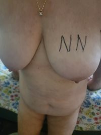 My wife's large breast and small nipples