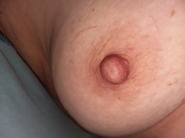 Tracey's hairy nipple.