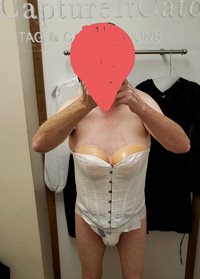 Wearing my corset and diaper with my breastforms so that I can try on dress...