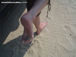 watch out that sand is hottt, needs something to cool them off....