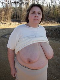 My BBW wife showing her tits outdoors.