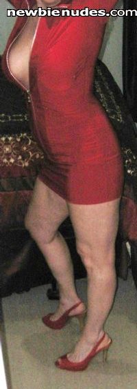 Slut Wife posing with her red dress...