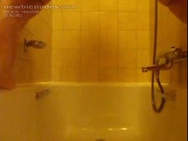 Helena pissing in bathtub showing open butthole