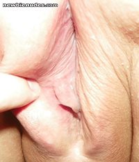 after a fresh deposit begins slowly leaking from the wife's pussy