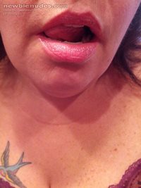 My mouth is open and lips wet for someone to shove a cock down my throat ti...