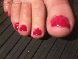 CockenCandy's red toenails