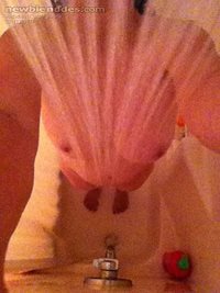 in the shower, thinking of getting cum sprayed on me!!