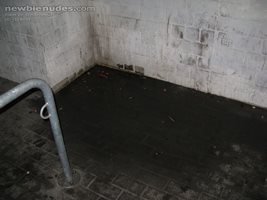 stinky public piss corner in the parking garage