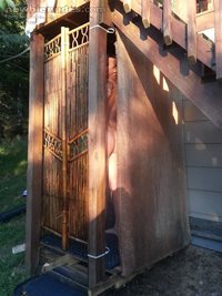 Enjoying the outdoor shower on a hot summer day... wanna join us??? :-)