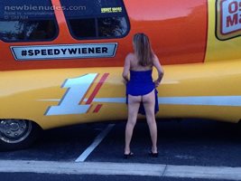 mom posing in front the weiner mobile - now thats a weiner that satisfies