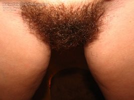 My girlfriend has a beautiful hairy pussy for a licking